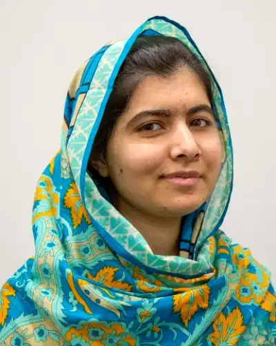 Malala Yousafzai speaking at an event in 2015